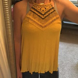 Mustard and navy detail racerback tank!